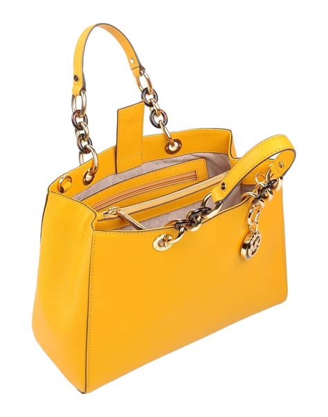 michael kors yellow studded wallet|Michael Kors purses clearance yellow.